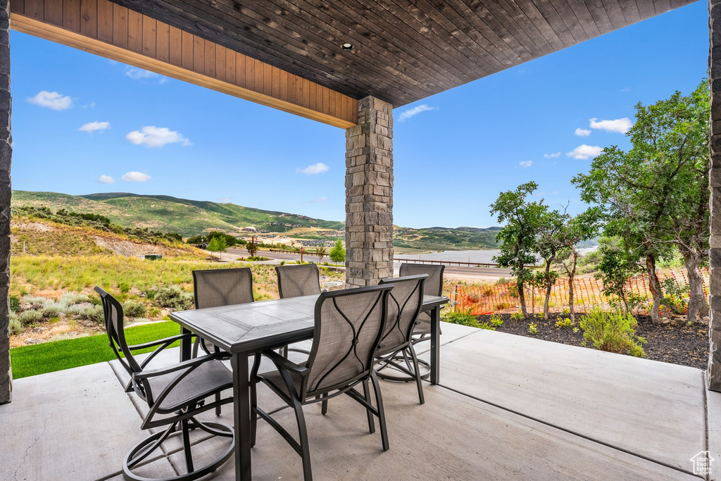 View of patio / terrace with a mountain view