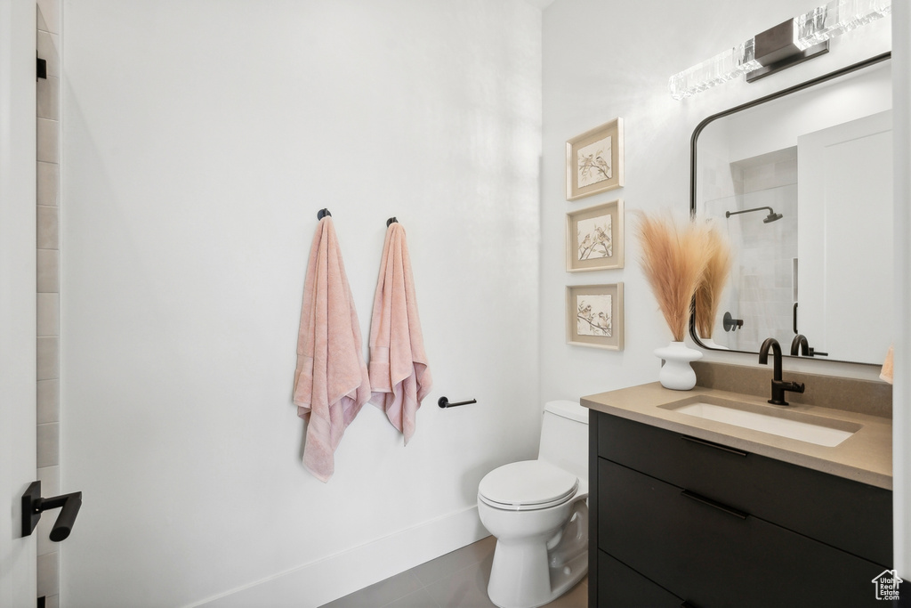 Bathroom with vanity and toilet