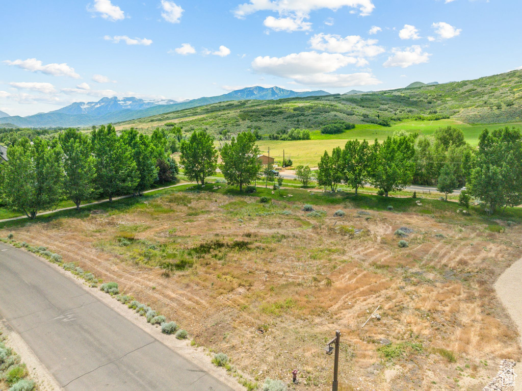 Property view of mountains featuring a rural view