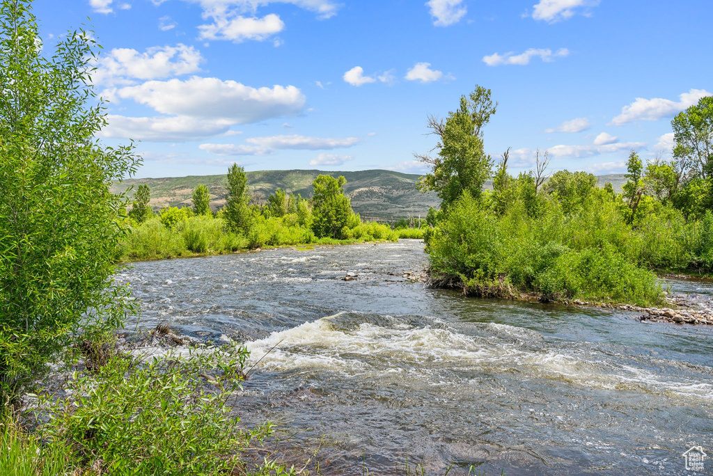 Property view of water with a mountain view