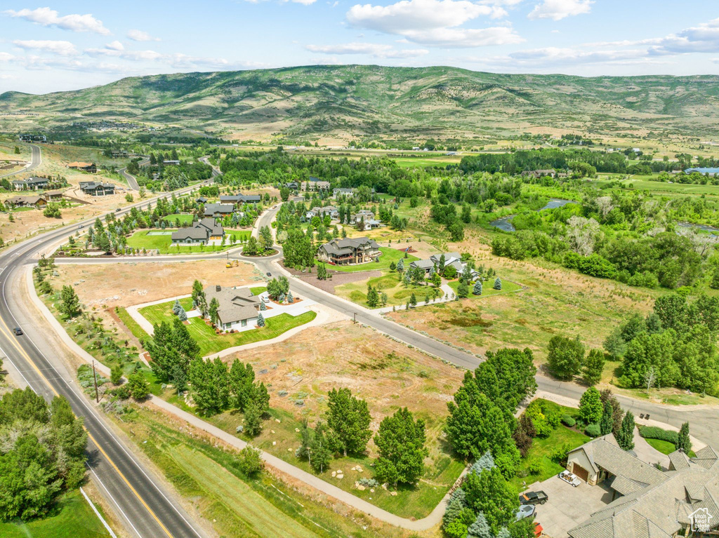 Birds eye view of property featuring a mountain view