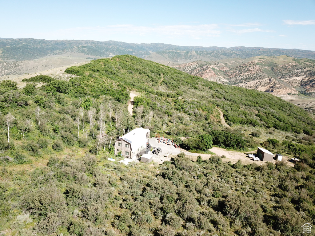 Birds eye view of property featuring a mountain view