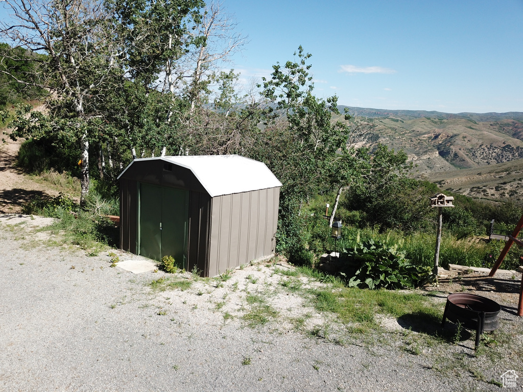 View of outdoor structure featuring a mountain view