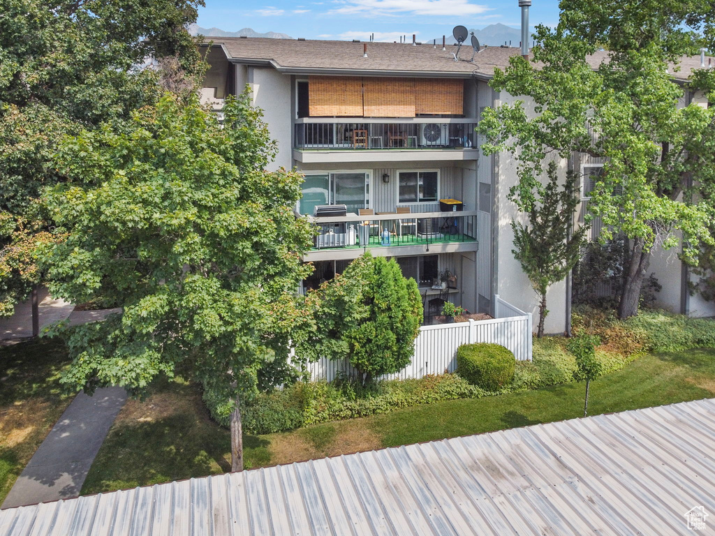 Rear view of house with a balcony