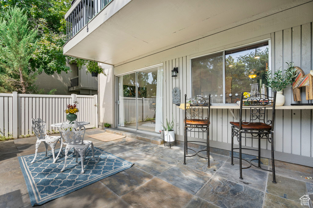 View of patio featuring exterior bar