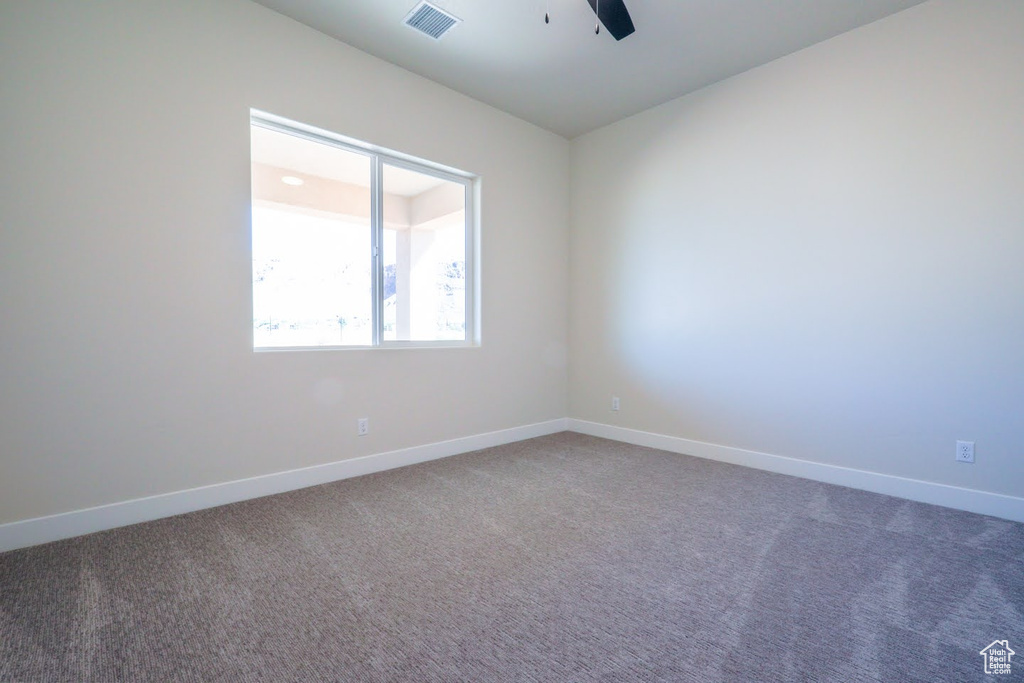 View of carpeted spare room