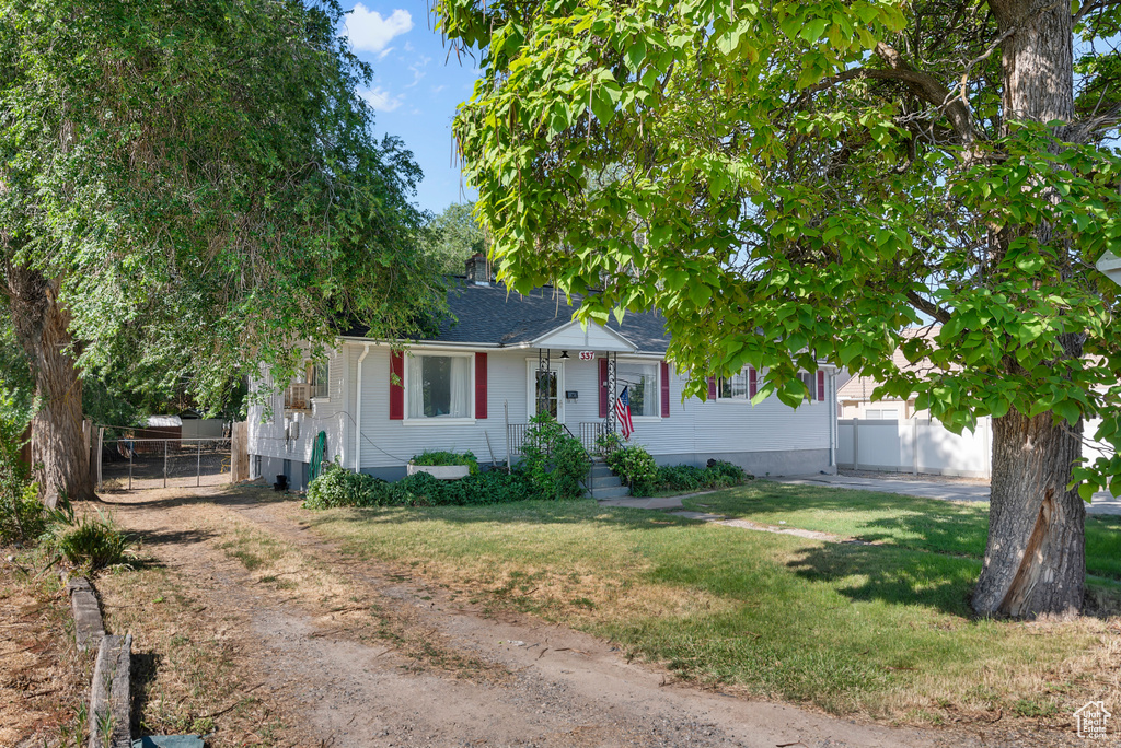 View of front of house with a front lawn