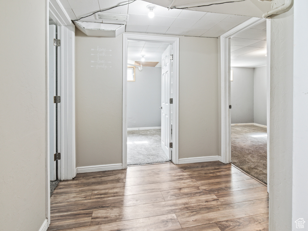 Hall featuring wood-type flooring