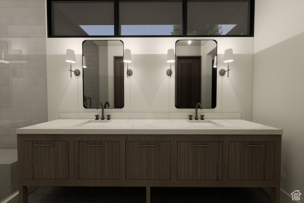 Bathroom with tile walls and double sink vanity