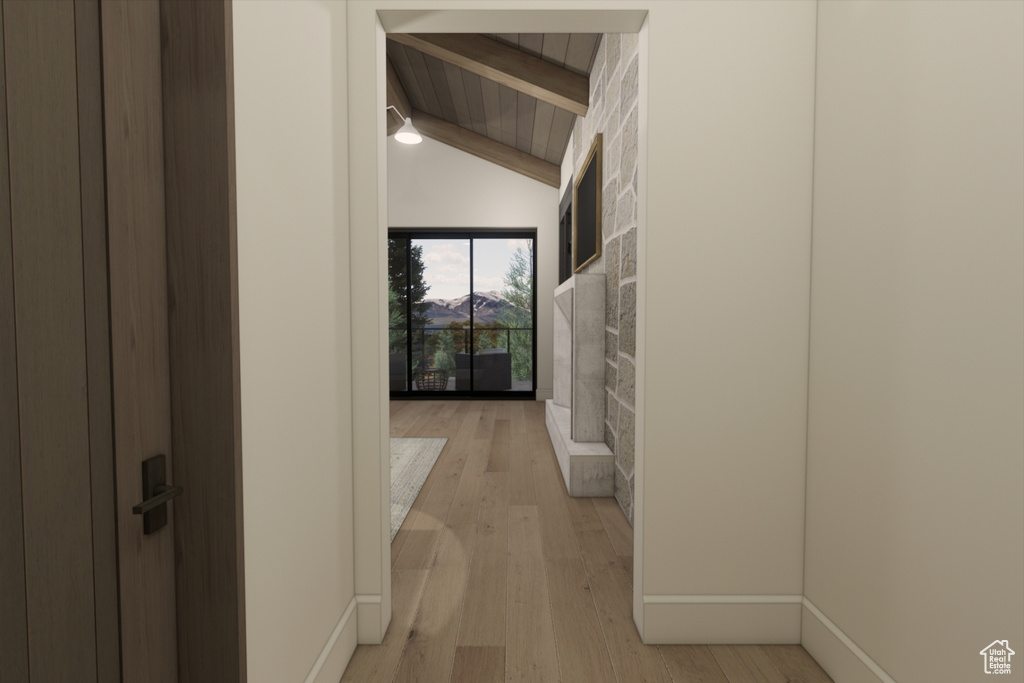 Hallway featuring light hardwood / wood-style floors, lofted ceiling with beams, and wooden ceiling