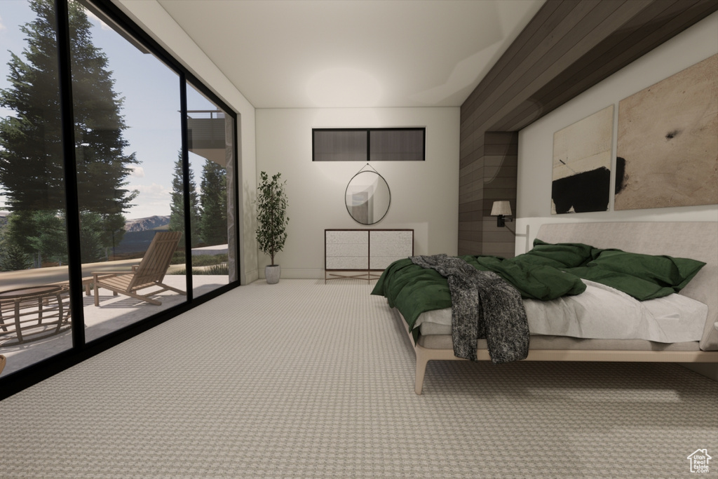 Carpeted bedroom with access to outside