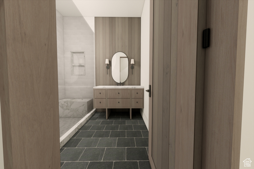 Bathroom featuring tile patterned flooring and a shower