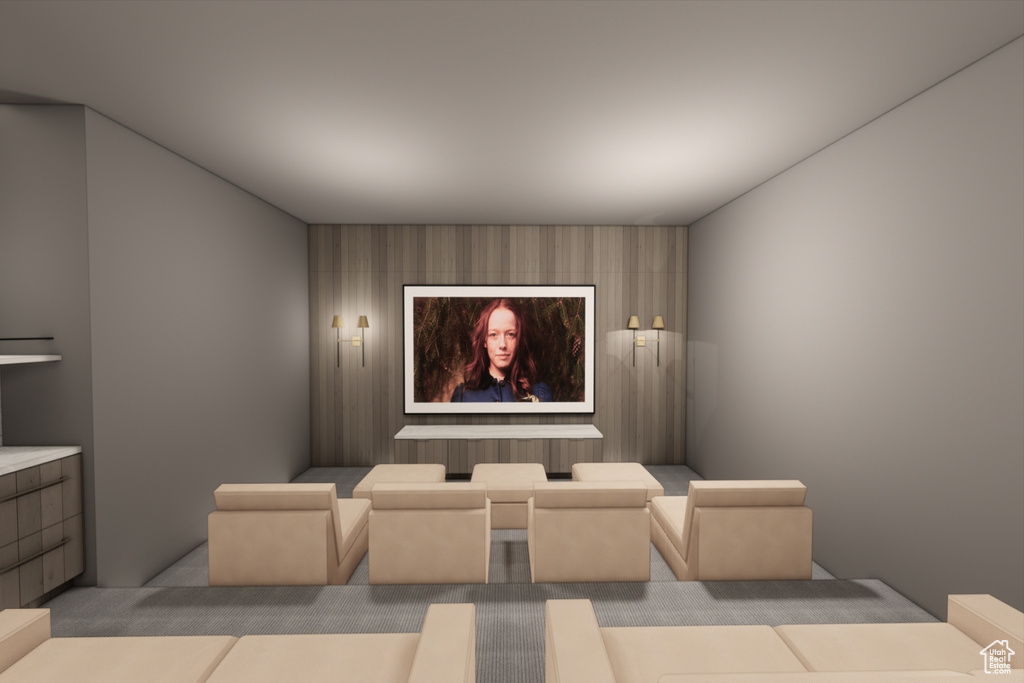 Home theater room with carpet flooring