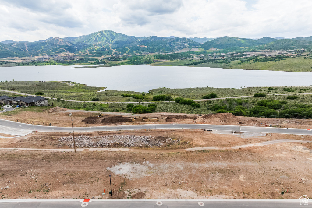 Mountain view featuring a water view