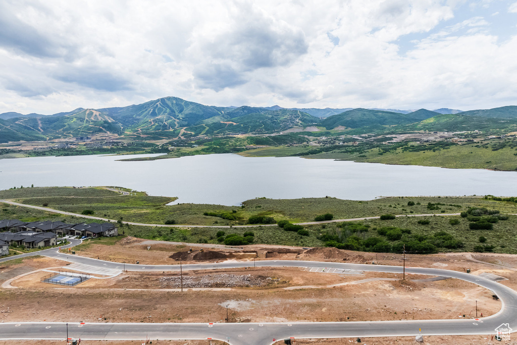 Mountain view featuring a water view