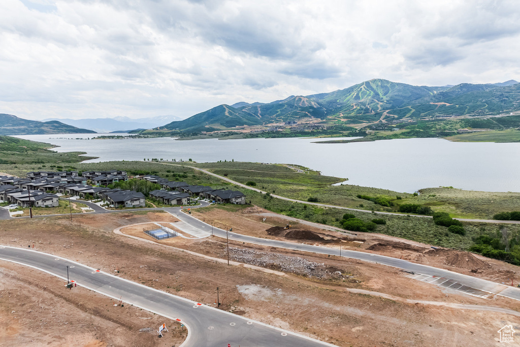 Mountain view featuring a water view
