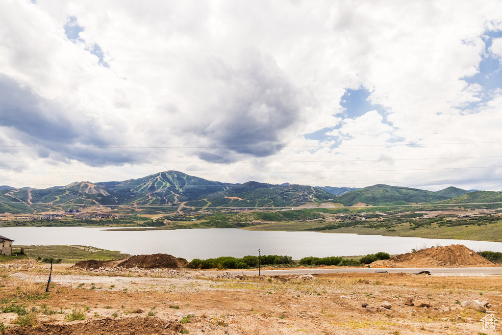 Mountain view featuring a water view