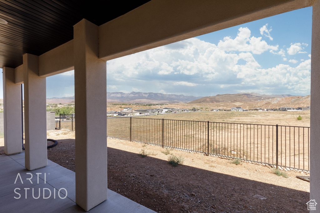 View of patio with a mountain view