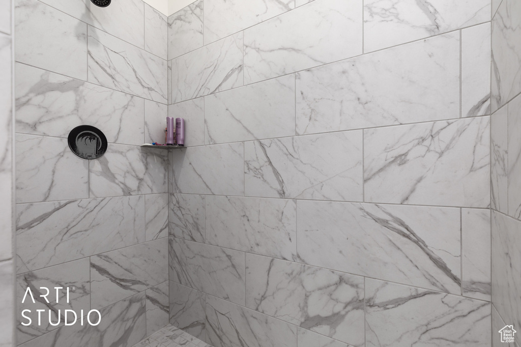 Bathroom with tiled shower