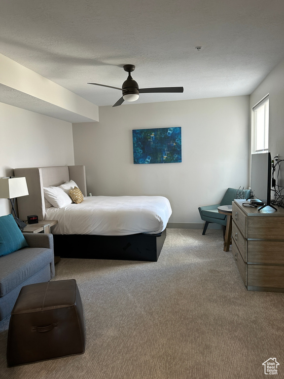 Bedroom with carpet floors and ceiling fan