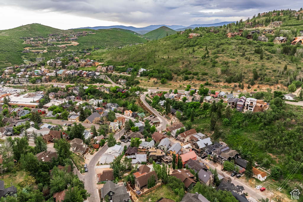 Birds eye view of property with a mountain view