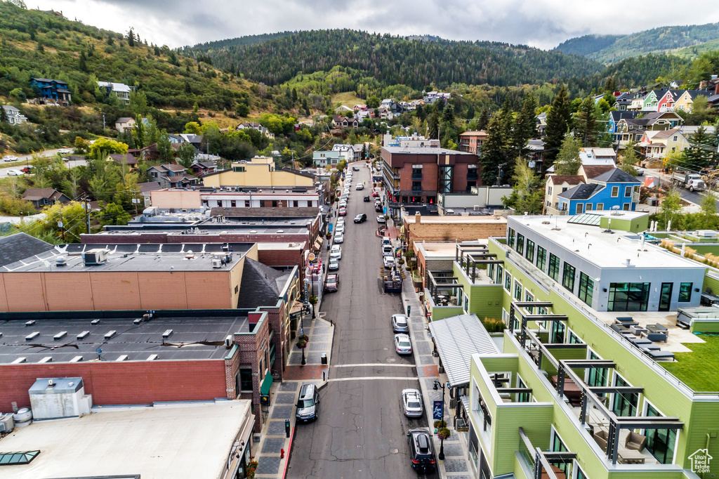 Birds eye view of property with a mountain view