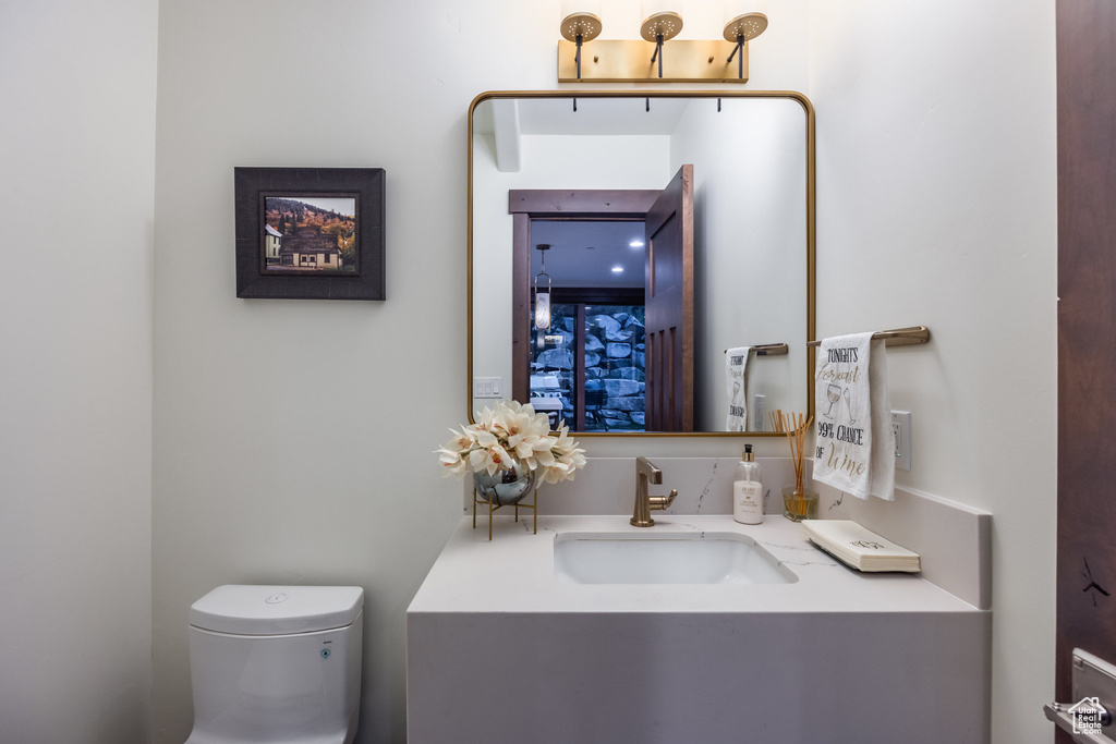 Bathroom with vanity and toilet