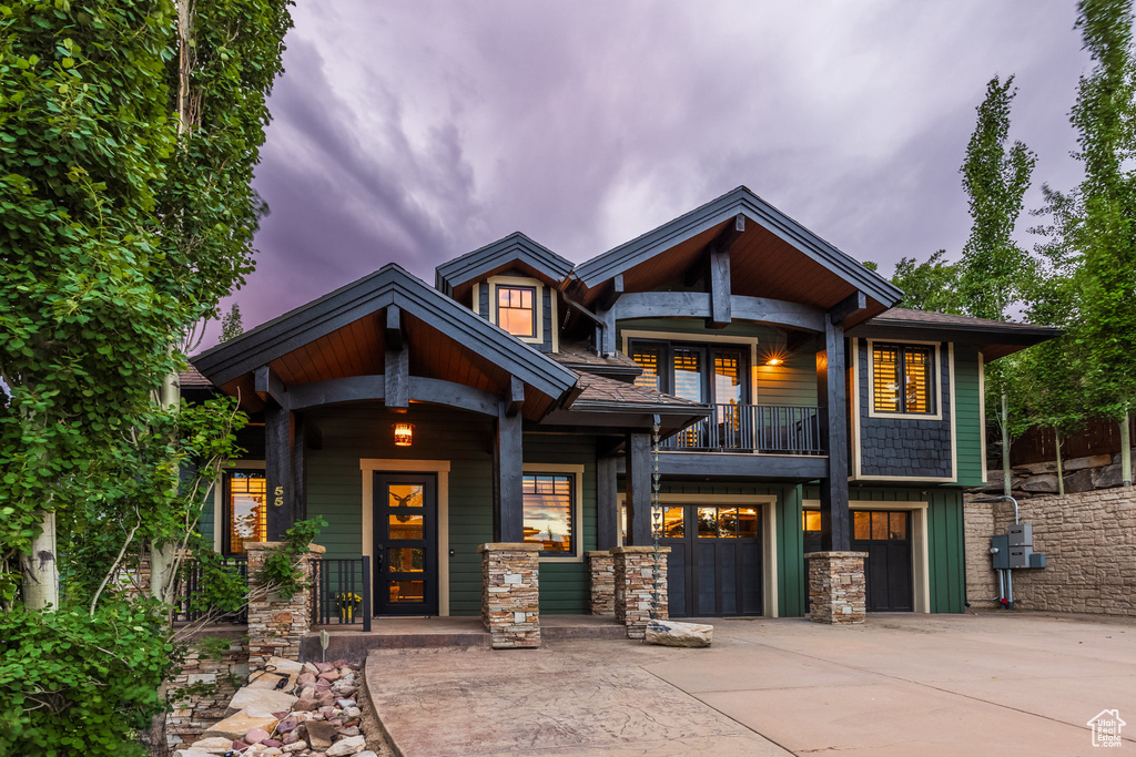 Craftsman inspired home with a balcony