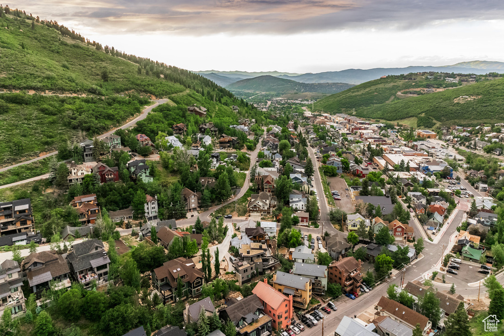 Aerial view at dusk featuring a mountain view