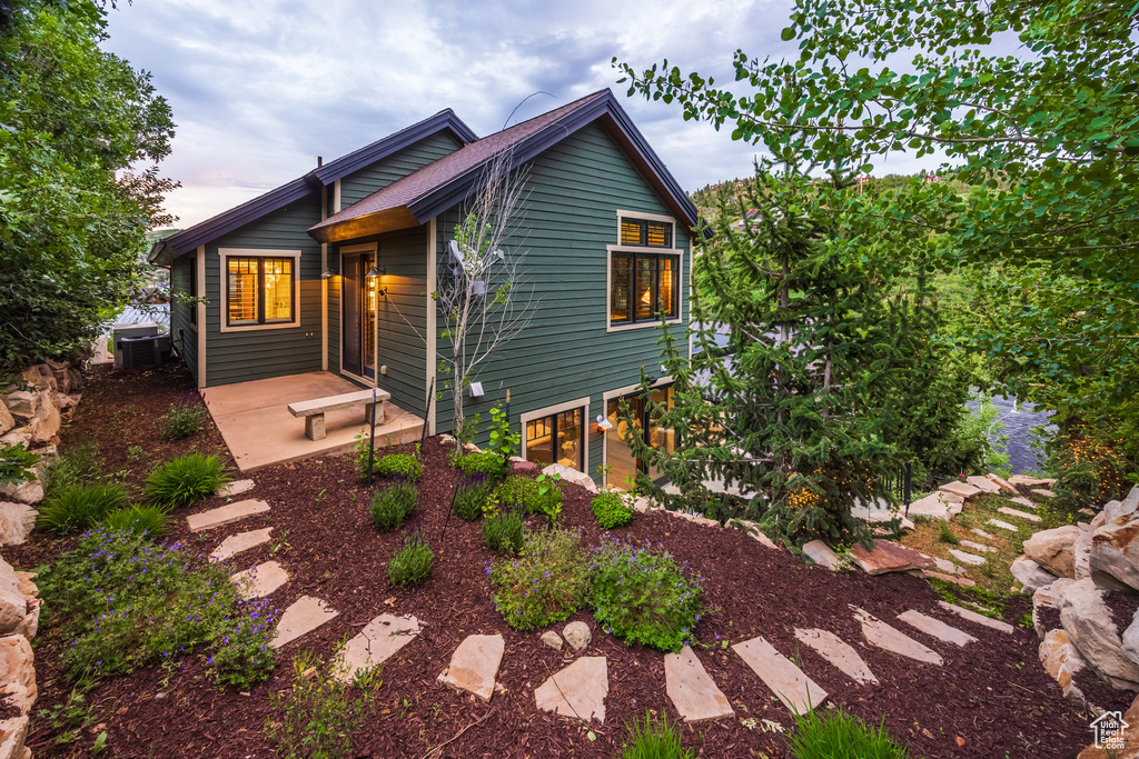 View of front of house with a patio