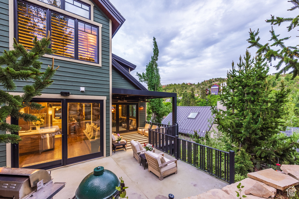 View of patio / terrace featuring a deck