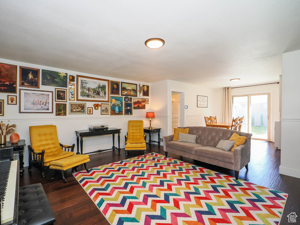 Living room with hardwood / wood-style floors