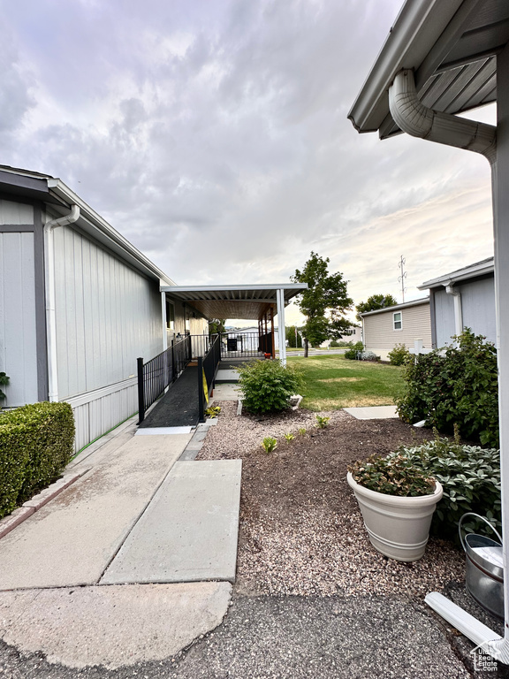 View of yard featuring a carport