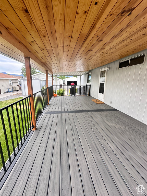 Deck featuring a yard