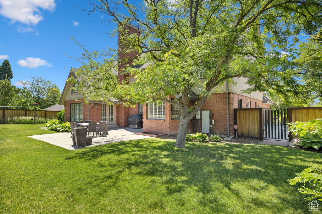 View of yard featuring a patio area