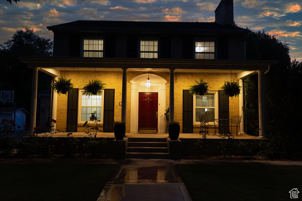 View of front of property featuring covered porch