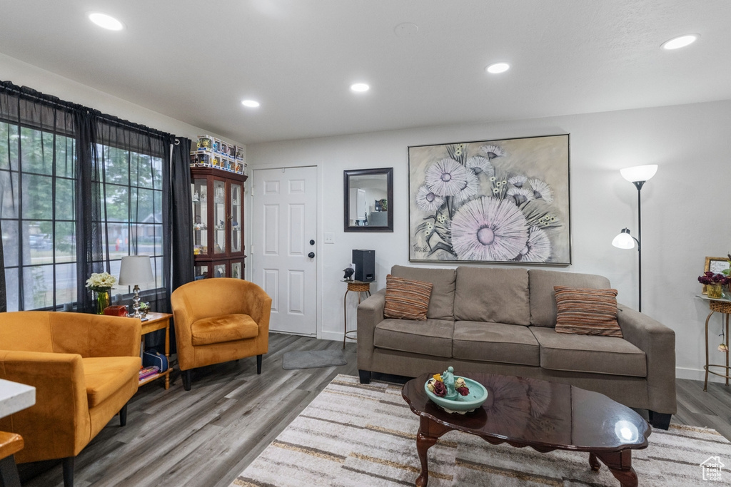 Living room with hardwood / wood-style floors