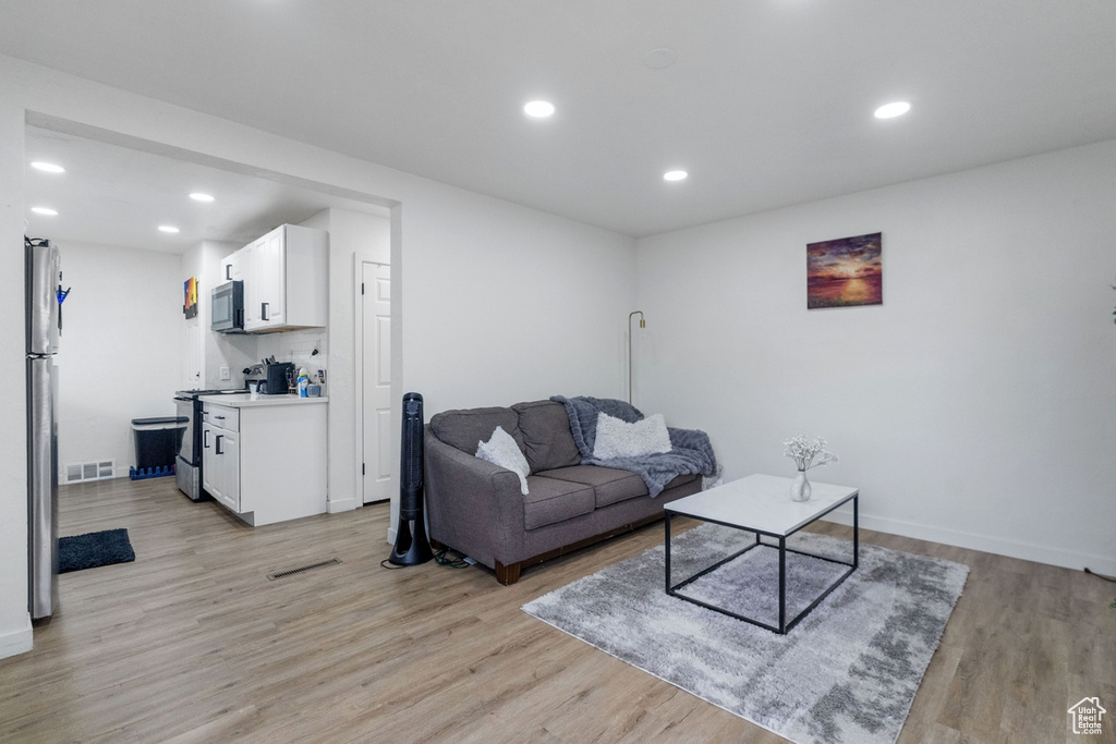 Living room featuring light hardwood / wood-style floors