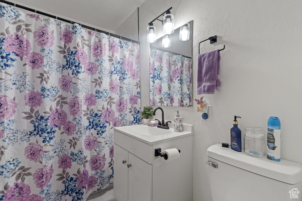 Bathroom with vanity and toilet