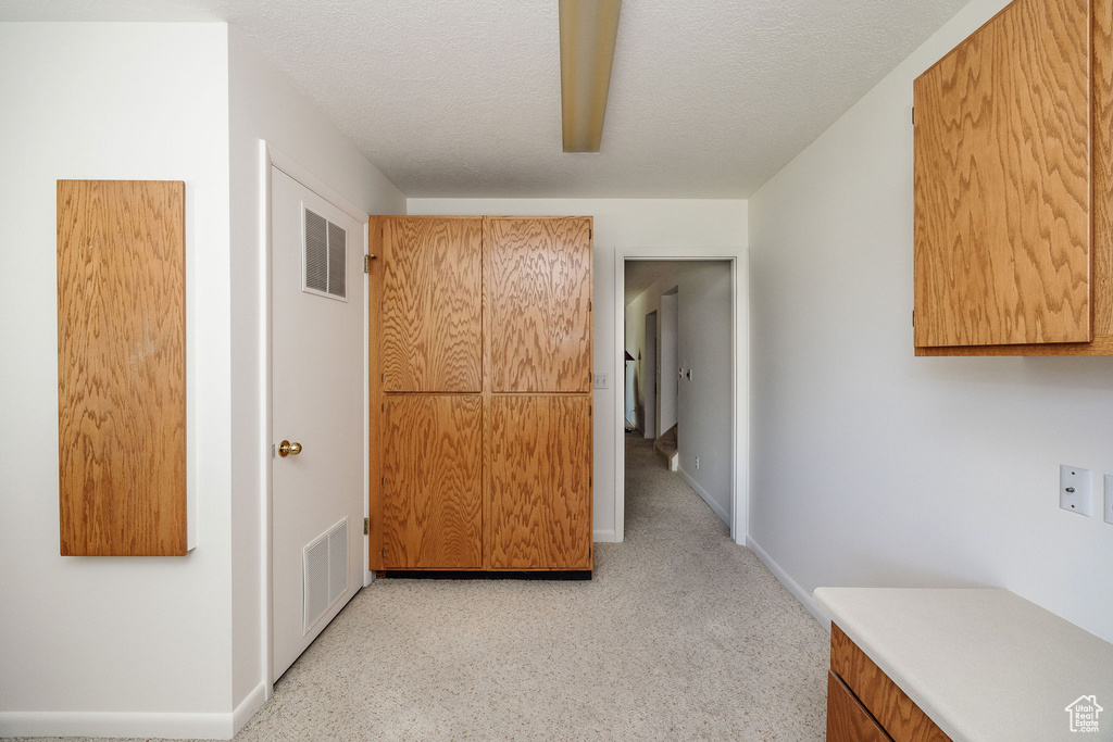 Interior space with a textured ceiling