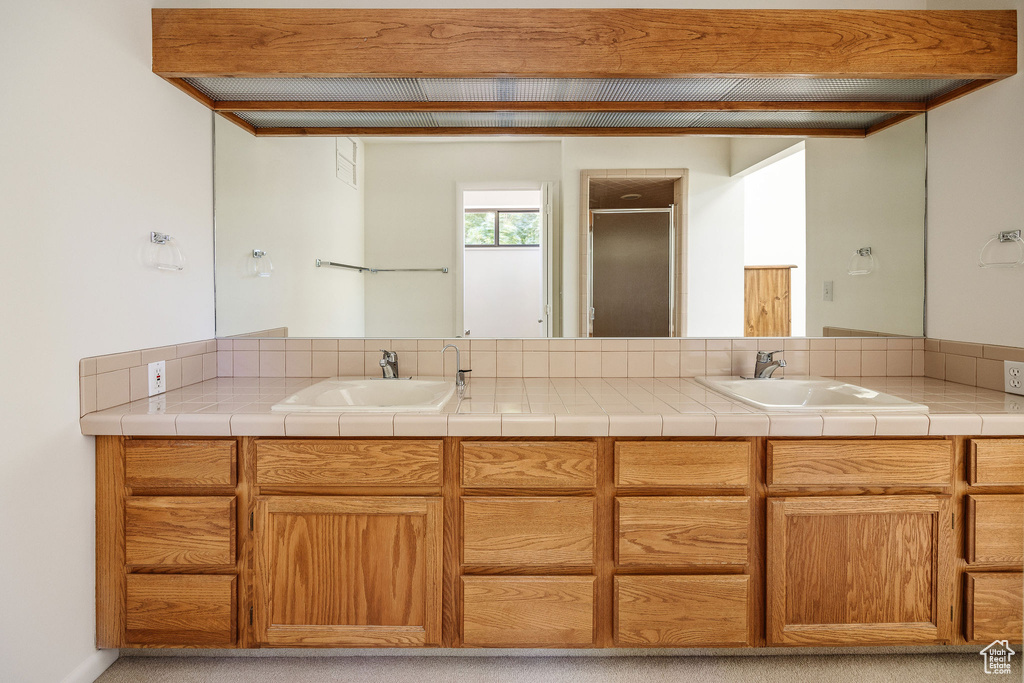 Bathroom featuring double sink vanity