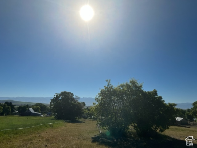 View of nature featuring a mountain view and a rural view