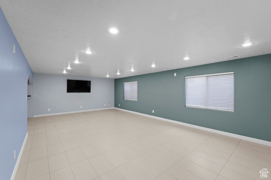 Interior space featuring light tile patterned floors