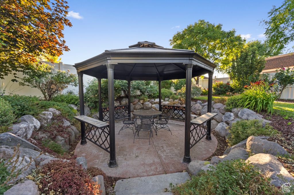 View of patio featuring a gazebo