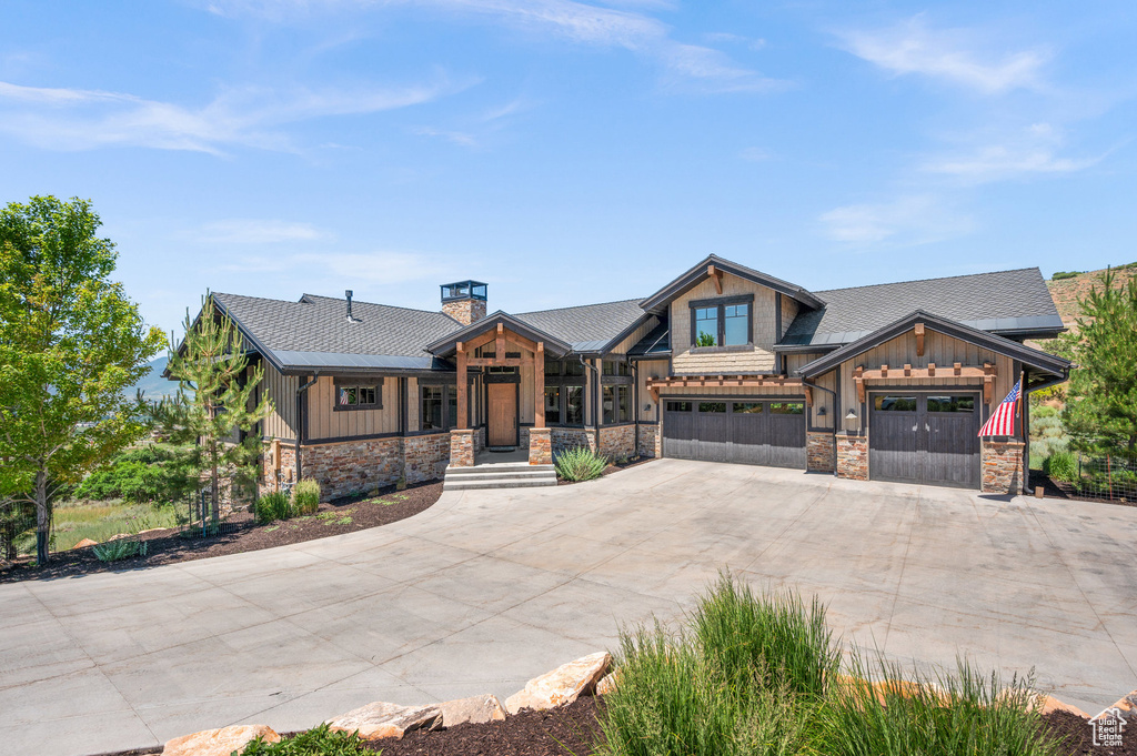 Craftsman inspired home featuring a garage