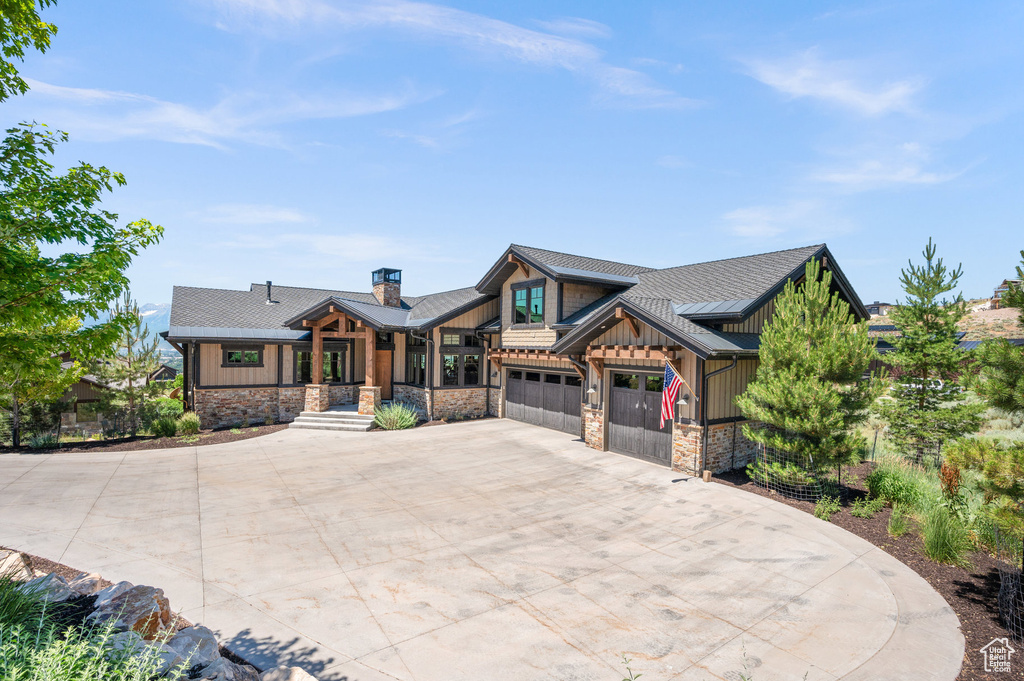 Craftsman house featuring a garage