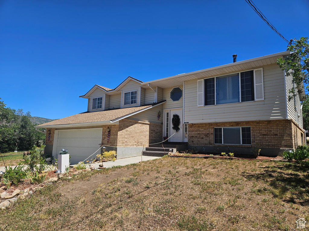 View of front of house featuring a garage