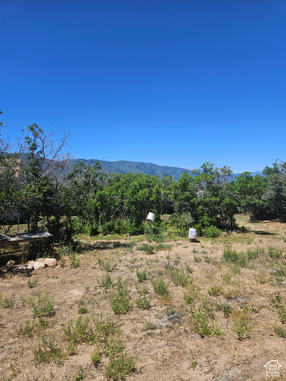 Property view of mountains featuring a rural view