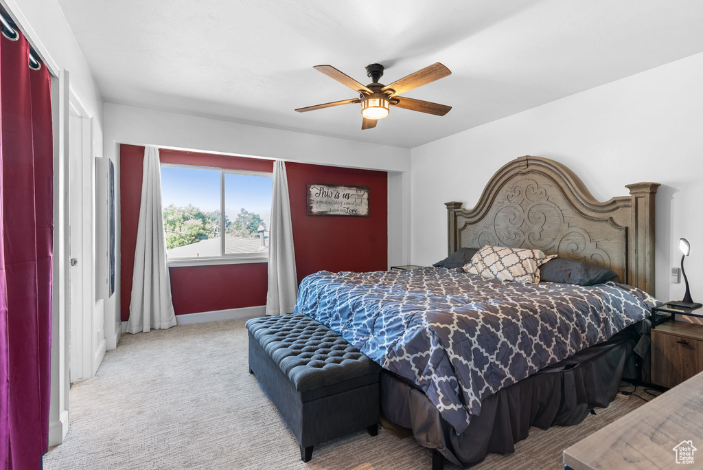 Bedroom with carpet floors and ceiling fan