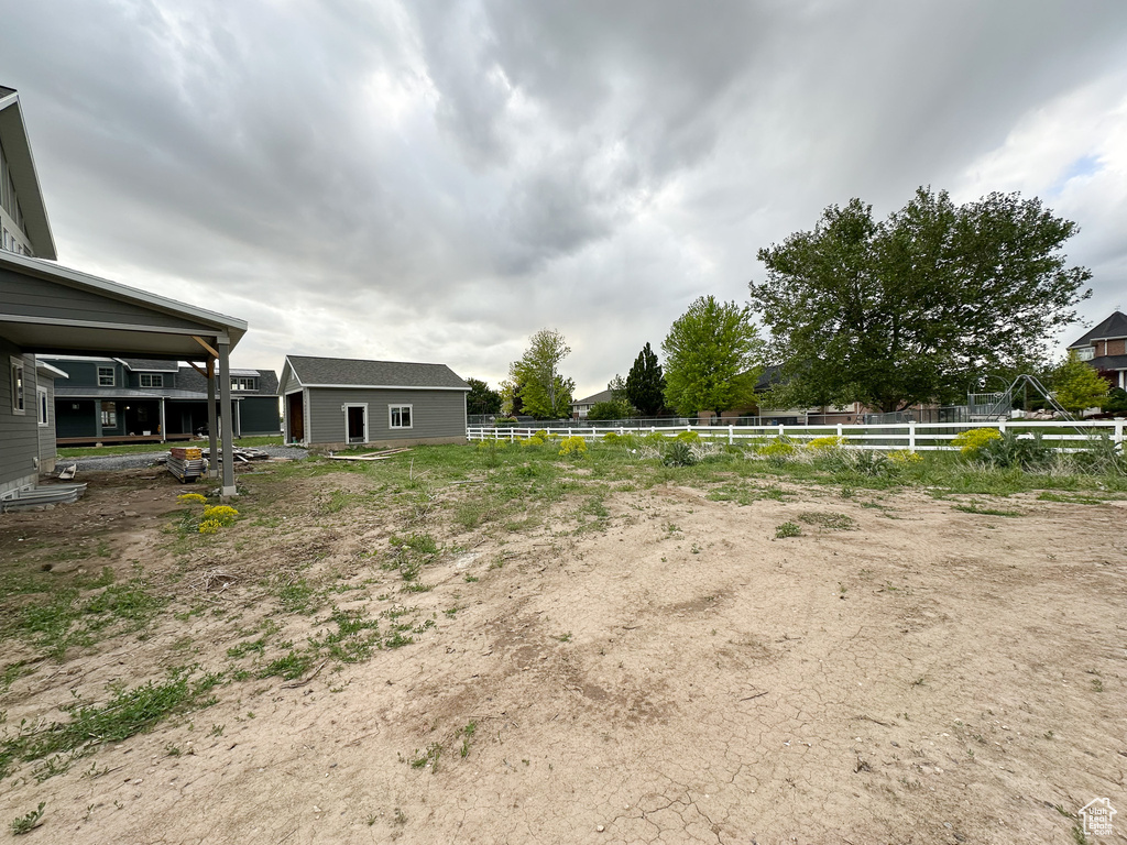 View of yard with fence